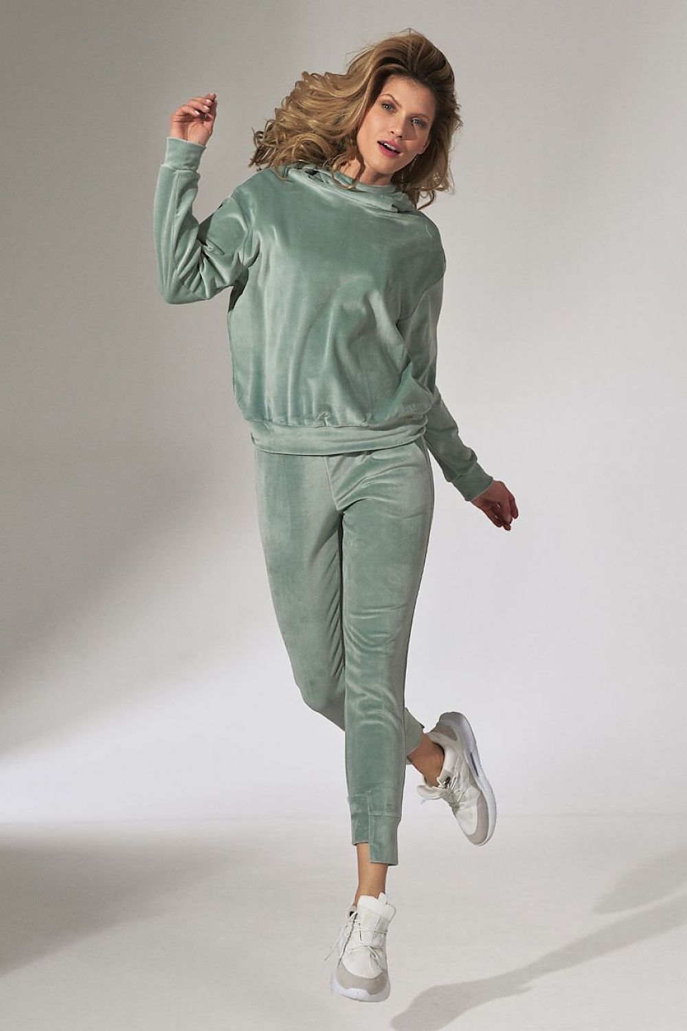 Anibe Lifestyle - Mjukisbyxor i velour med fickor och asymmetrisk mudd